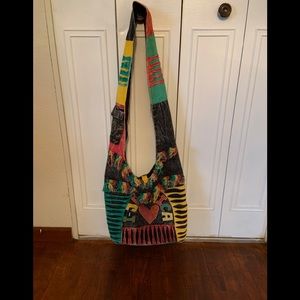 Embroidered crossbody bag.